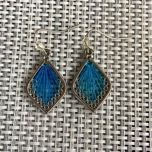 Silver and blue dangly earrings